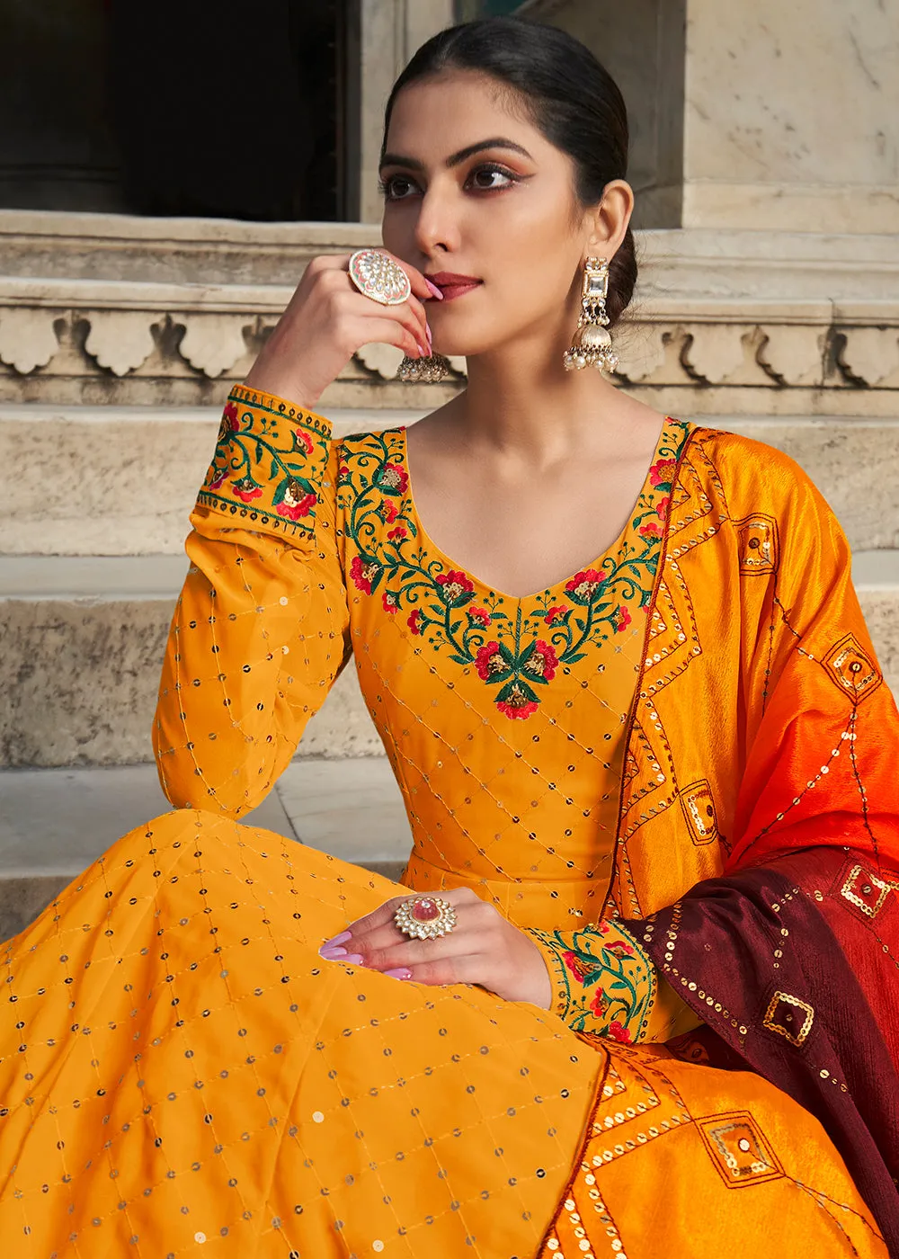 Fascinating Yellow Sequins Georgette Party Wear Festive Gown